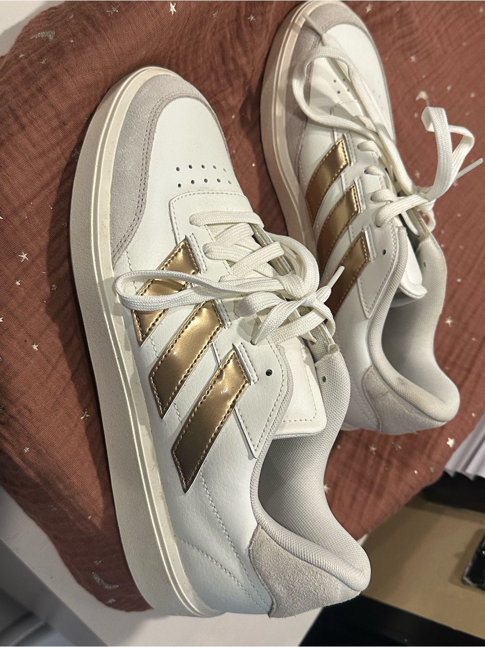 adidas Women’s White Sneakers with Metallic Gold Stripes